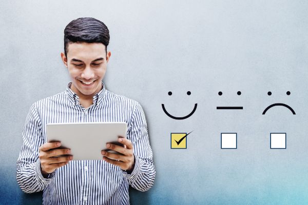 Happy customer filling out a feedback survey