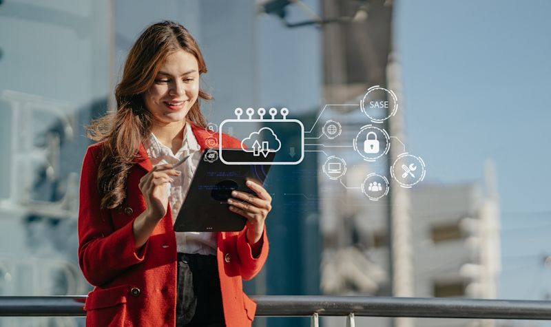 woman accessing cloud backups via a tablet