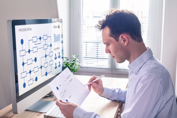 An HR representative reviewing paperwork