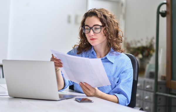 A woman reviewing a budget