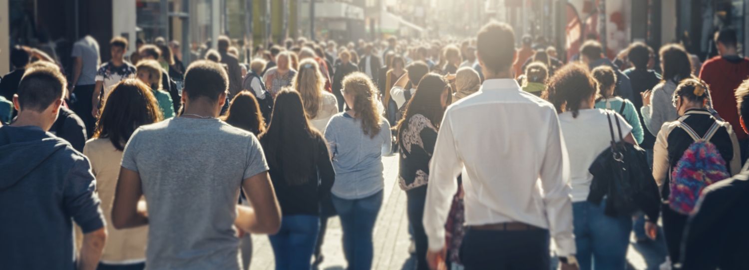 crowded city street with many pedestrians