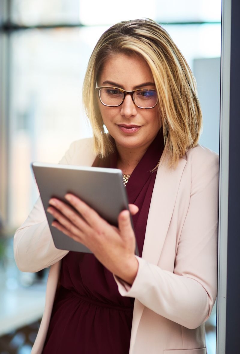 businesswoman using a tablet device