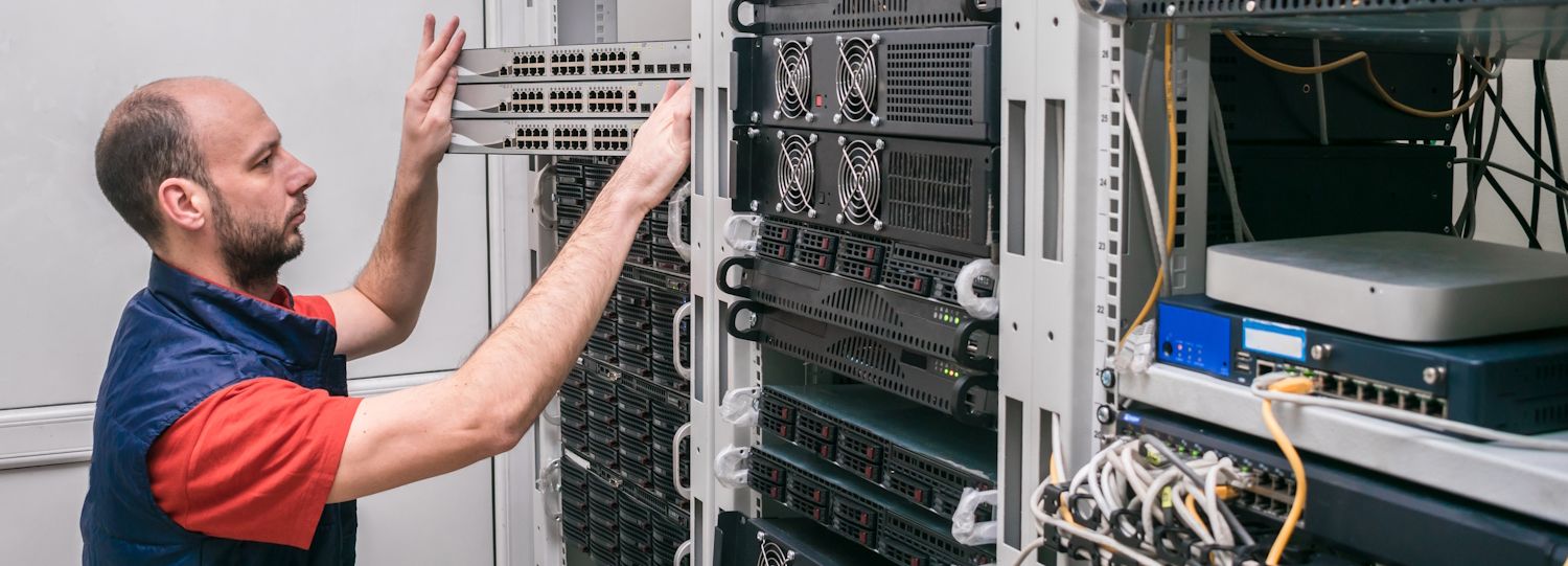 it employee working on a server