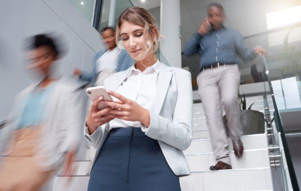 A woman using wi-fi on her phone